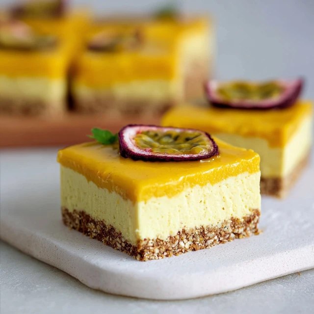 Passion fruit cheesecake bars stacked on a white marble board, golden graham cracker crust on the bottom, creamy white cheesecake layer in the middle, vibrant orange-yellow passion fruit topping with visible black seeds on top